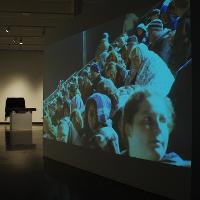 An large exhibit of a crowd of people 