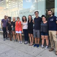 Students smiling outside the Nancy Hoffman Gallery 