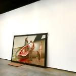 Large painting of Bo's leaning against a wall