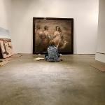 Large painting of Bo's leaning against a wall