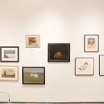 Artwork hanging on gallery walls