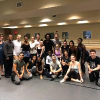 Group of dance students posing in practice room