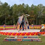 Sculpture of stained glass in the shape of a 3 dimensional triangle