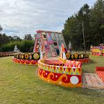 Sculpture of stained glass in the shape of a 3 dimensional triangle