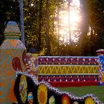Colorful decorated walls and totem sculptures at Pasaquan