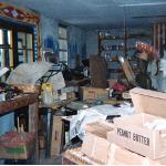 Interior art work room at Pasaquan filled with paintings and creative materials