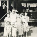 Young Eddie Owens Martin posing with his family