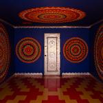 Interior medallion room at Pasaquan with colorful circular wall art