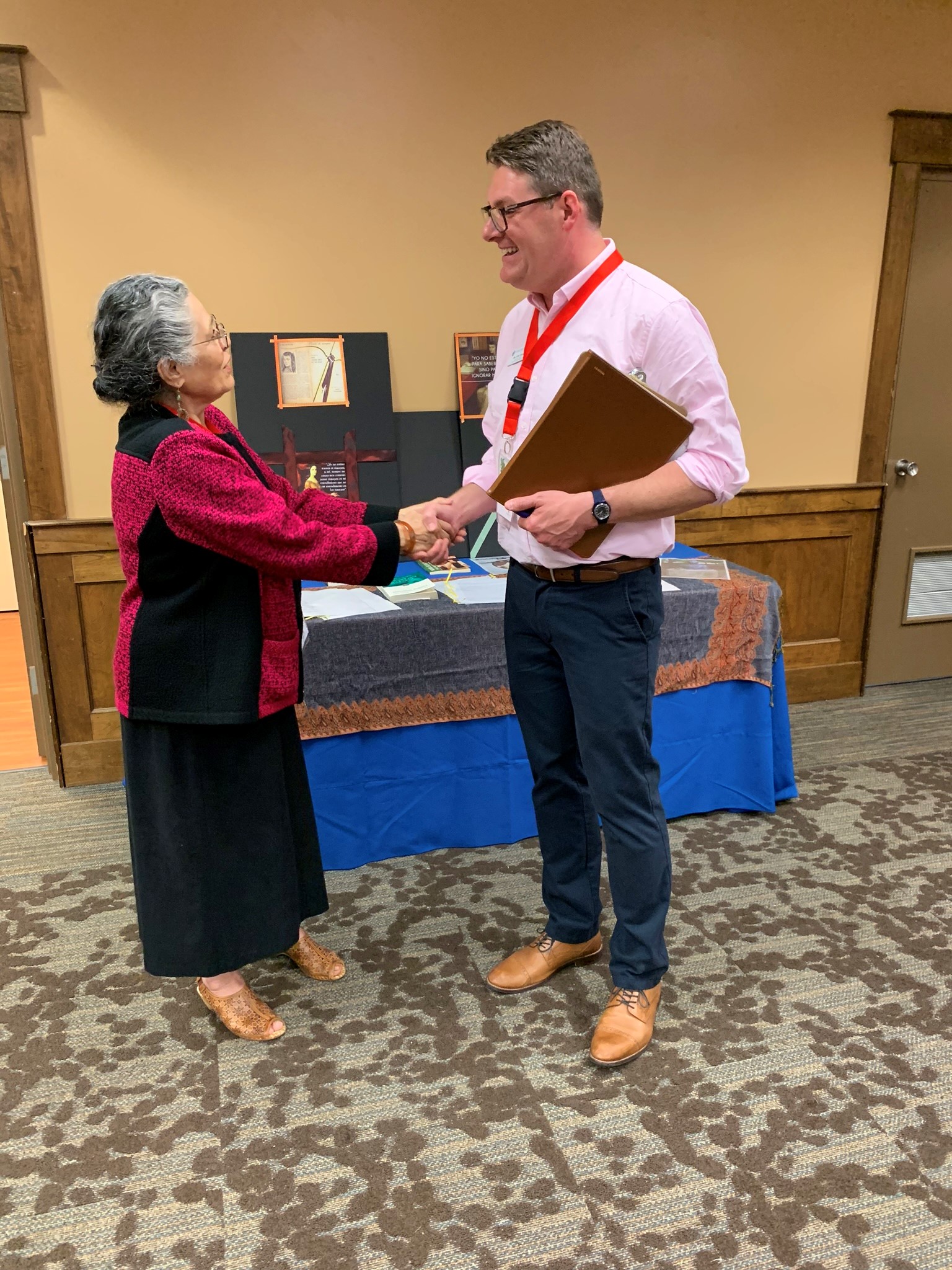 a man and a woman shaking hands
