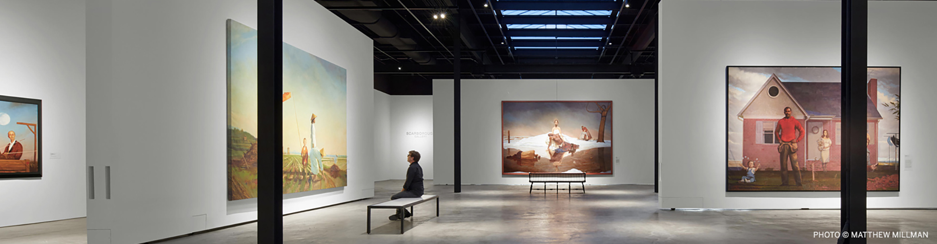 Bo Barlett Center with man sitting on bench