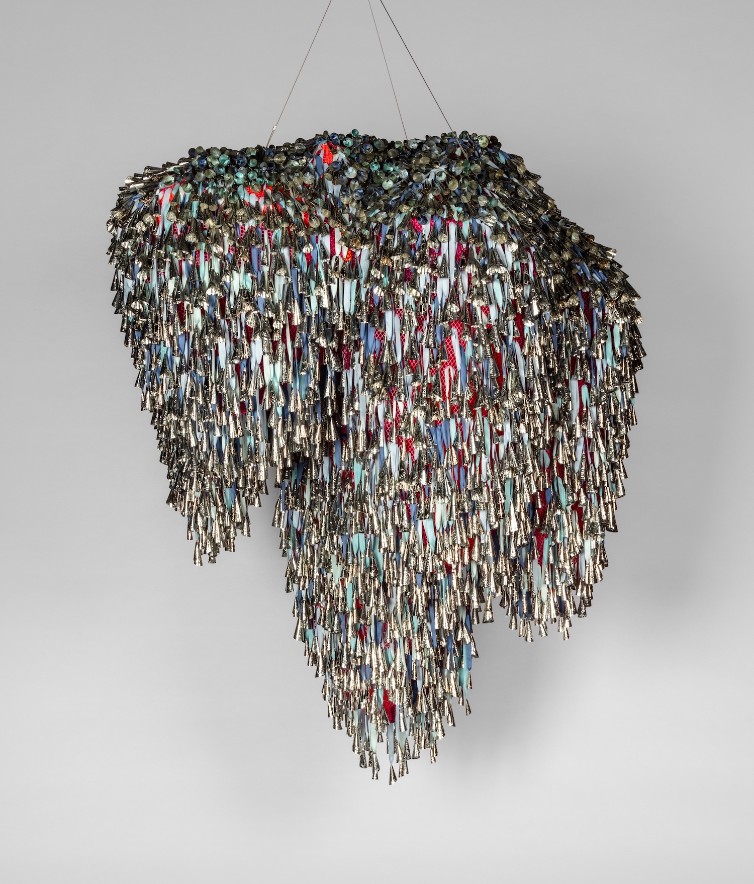 Tin jingles, polyester, twill tape, polyester mesh, steel,