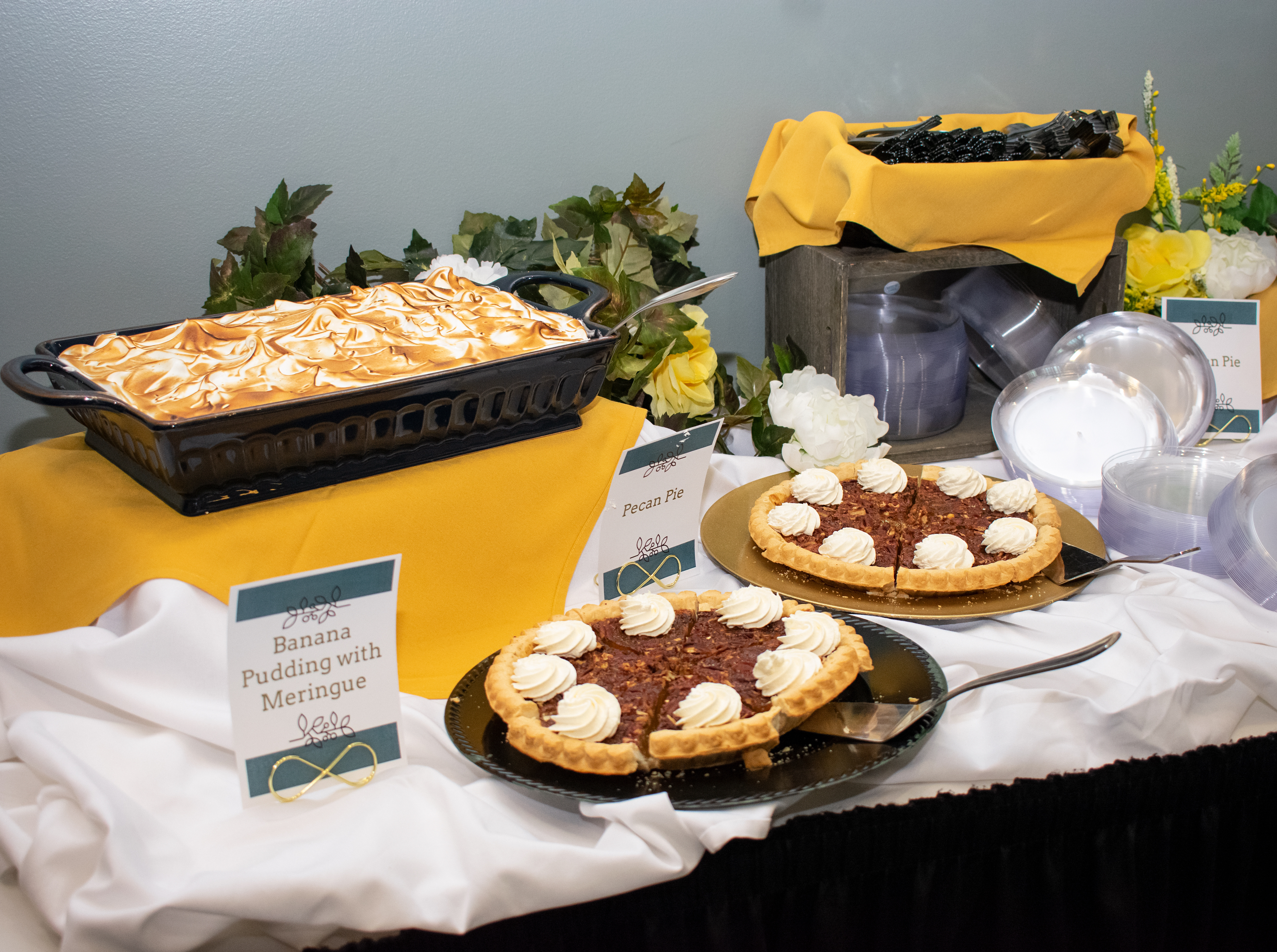 Dessert table with banana pudding and pecan pie