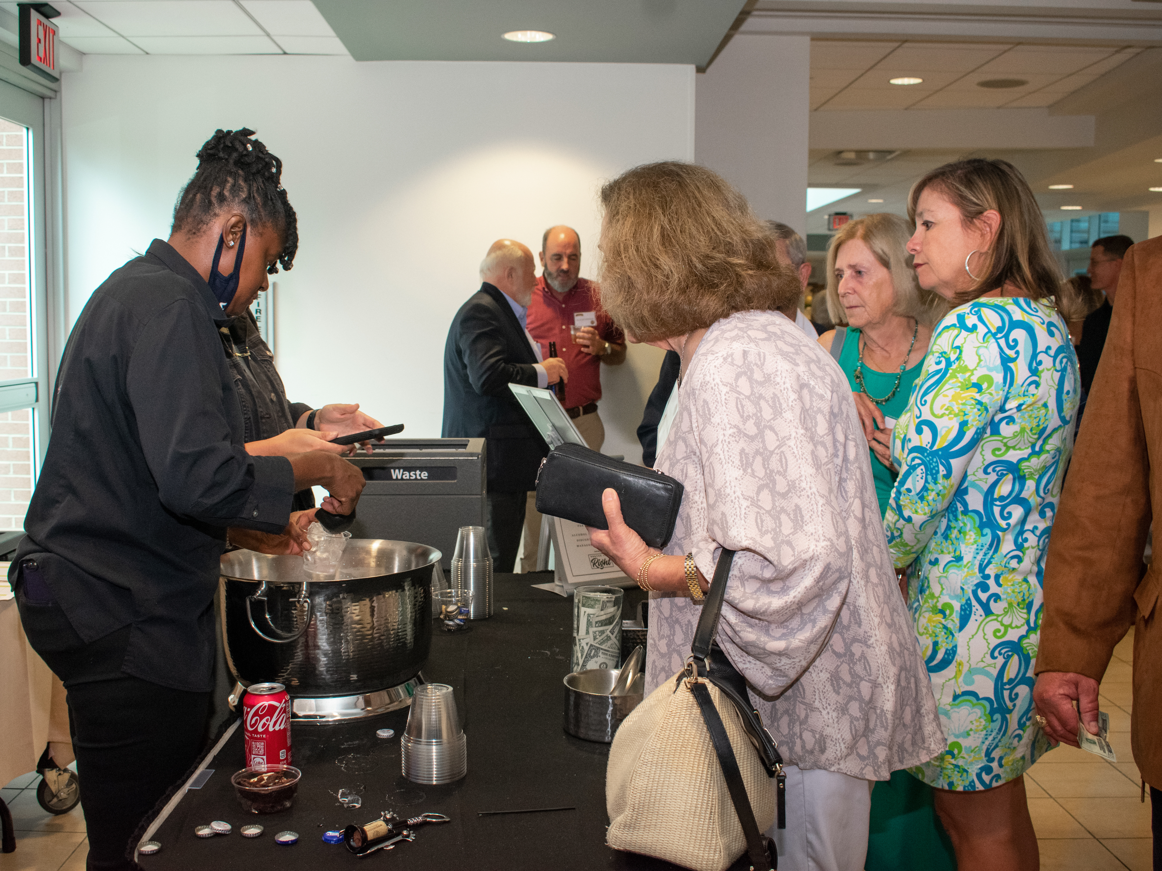 Bartenders serving drinks