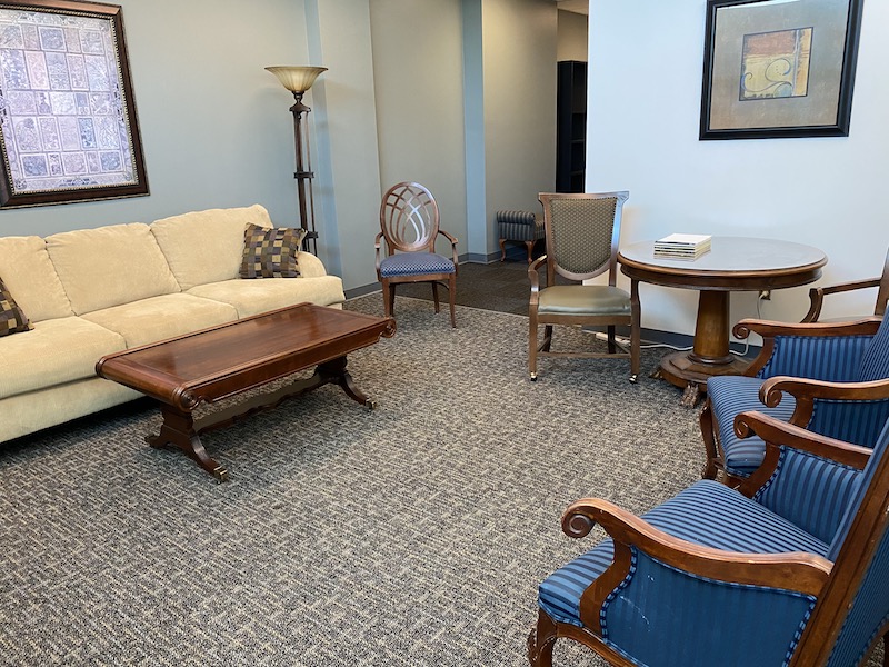 Meeting Room 200 with a couch chairs and small tables