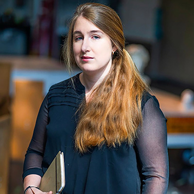 a headshot photo of Julianna Wells