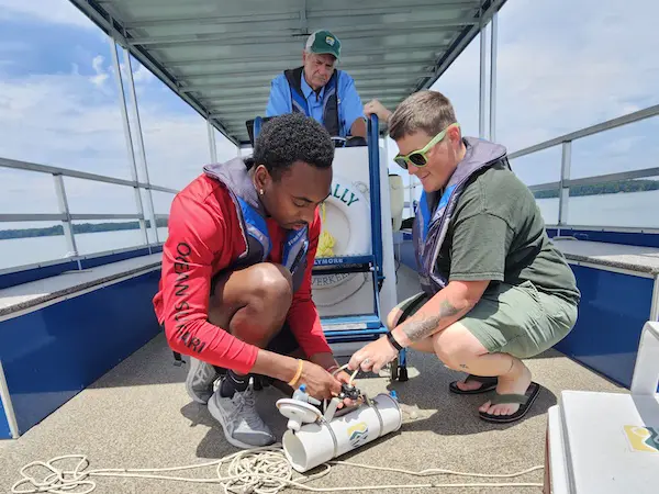 two students on a boat traveling abroad