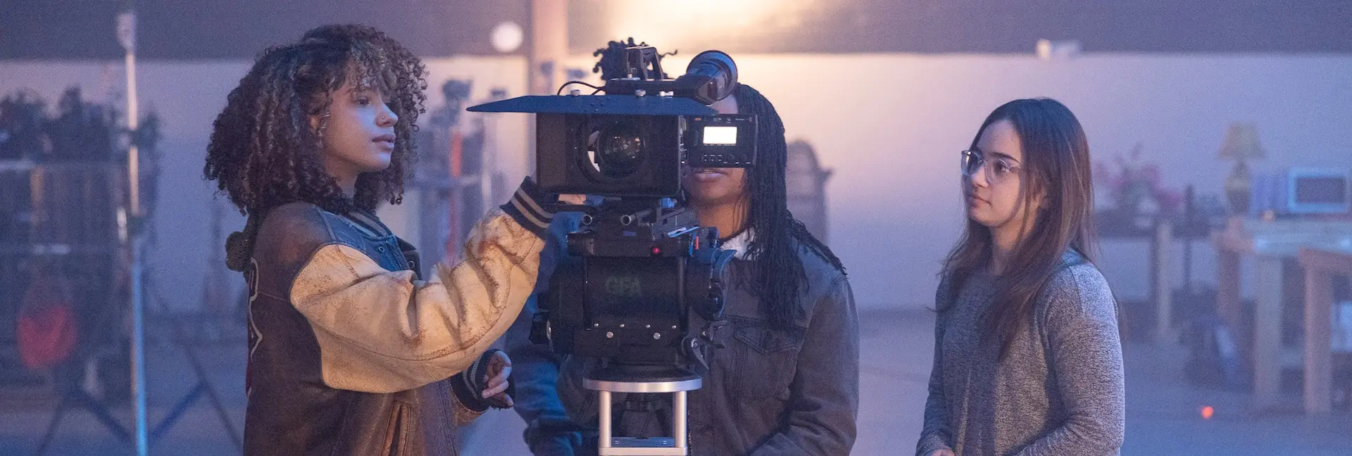 students working with film production equipment