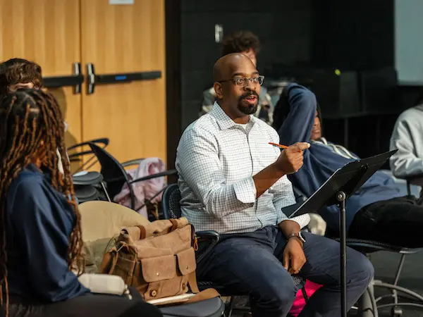 students having conversation in a classroom