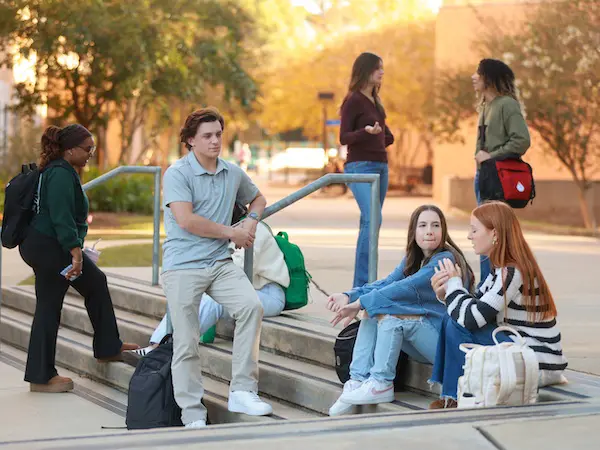 students hanging out on main campus