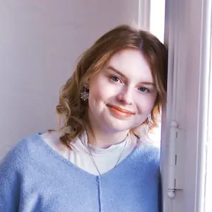 a headshot photo of Alana Audia