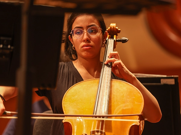 A student playing the cello.