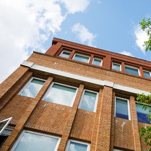 a brick building with several windows