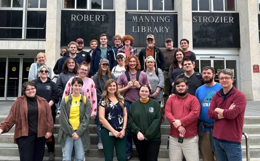 Students standing on the steps of the Robert Manning Strozier Library