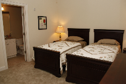 a bedroom with two text-sm beds