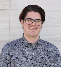 Micheal Lambert Photo man with brown hair and glasses