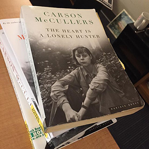 a stack of books about Carson McCullers