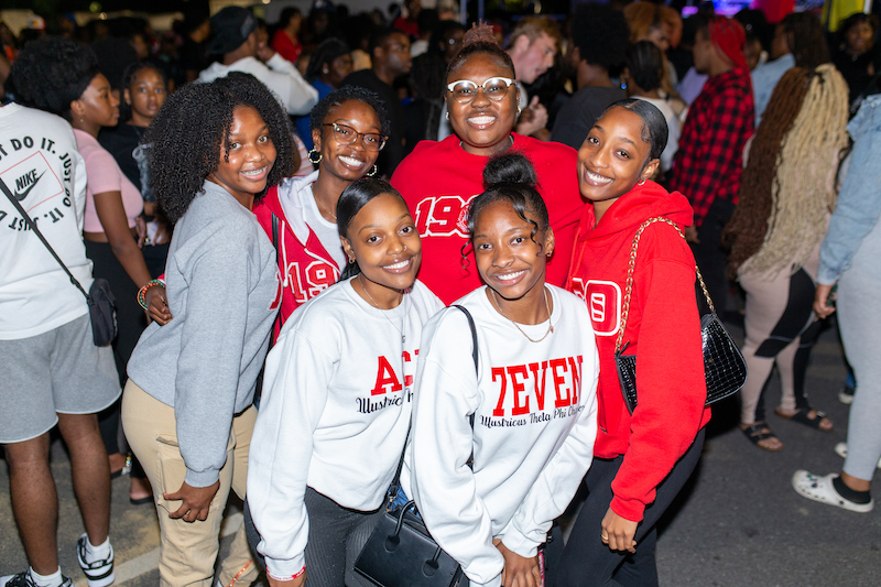 Sorority members posing outside