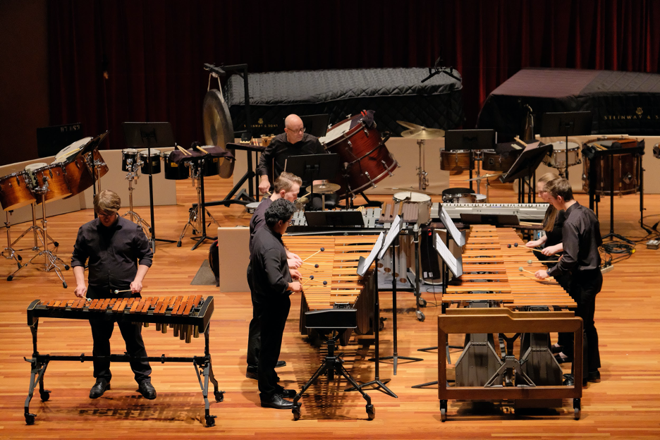 People playing Percussion Instruments