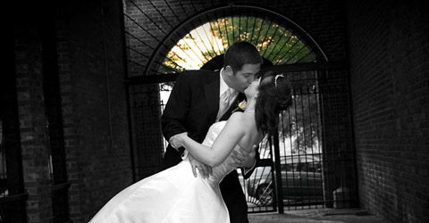 a groom holding a bride