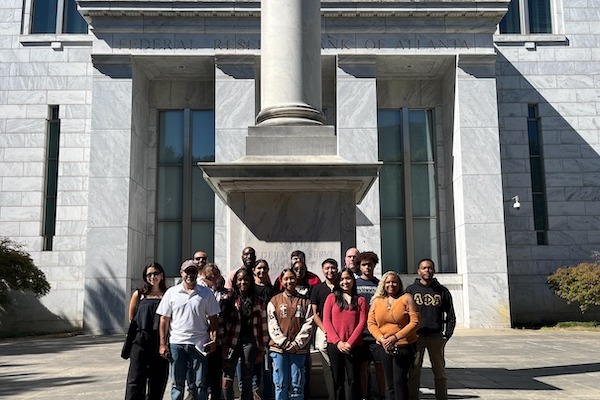 Students standing in front of the Federal Reserve Bank of Atlanta