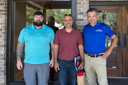 Dr. Mansour with Wealth Intelligence new location.