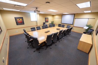 conference room with large central desk