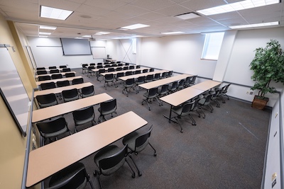 Classroom, long desks, chairs
